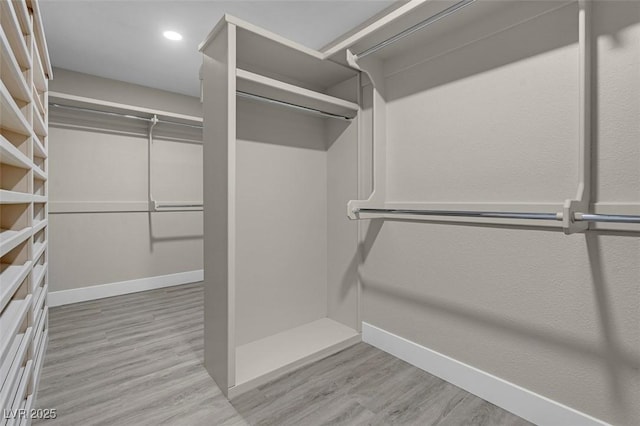 8232 Ocean Terrace Way, Las Vegas, NV 89128 - walk in closet with wood finished floors