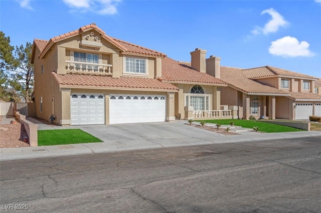 8232 Ocean Terrace Way, Las Vegas, NV 89128 - mediterranean / spanish home with a chimney, stucco siding, a tile roof, driveway, and a balcony