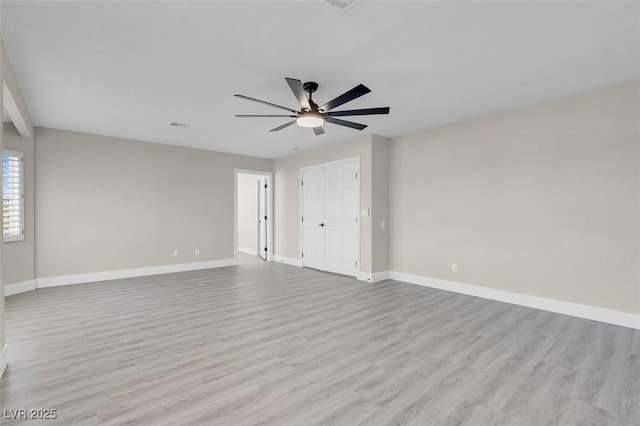 8232 Ocean Terrace Way, Las Vegas, NV 89128 - unfurnished room with a ceiling fan, wood finished floors, and baseboards
