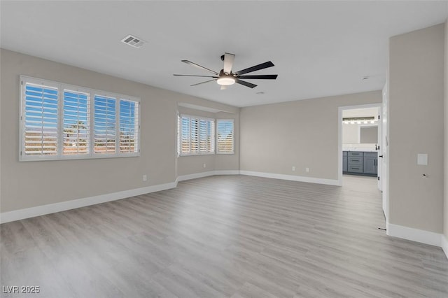 8232 Ocean Terrace Way, Las Vegas, NV 89128 - interior space with visible vents, ceiling fan, light wood-style flooring, and baseboards