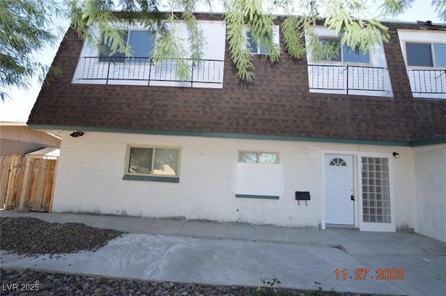 view of property with fence