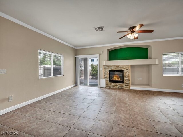 8728 Tom Noon Ave Unit 103, Las Vegas, NV 89178 - unfurnished living room featuring tile patterned flooring, a healthy amount of sunlight, and crown molding