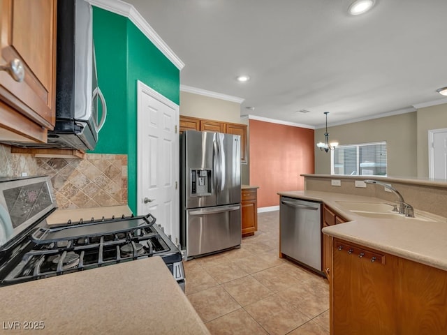 8728 Tom Noon Ave Unit 103, Las Vegas, NV 89178 - kitchen featuring a sink, brown cabinetry, stainless steel appliances, recessed lighting, and crown molding