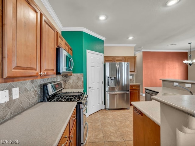 8728 Tom Noon Ave Unit 103, Las Vegas, NV 89178 - kitchen with recessed lighting, backsplash, appliances with stainless steel finishes, and a sink