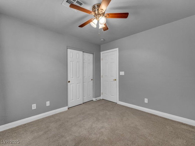 8728 Tom Noon Ave Unit 103, Las Vegas, NV 89178 - unfurnished bedroom featuring a closet, carpet, visible vents, a ceiling fan, and baseboards