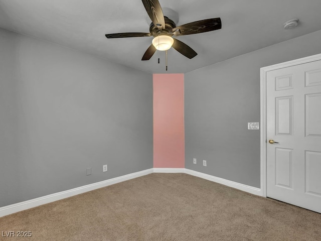 8728 Tom Noon Ave Unit 103, Las Vegas, NV 89178 - carpeted spare room with baseboards and a ceiling fan