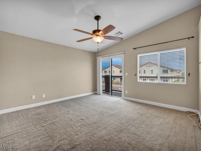 8728 Tom Noon Ave Unit 103, Las Vegas, NV 89178 - empty room featuring a ceiling fan, carpet, baseboards, visible vents, and vaulted ceiling