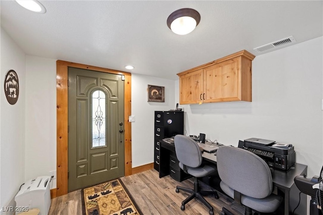 office area featuring recessed lighting, baseboards, visible vents, and light wood finished floors
