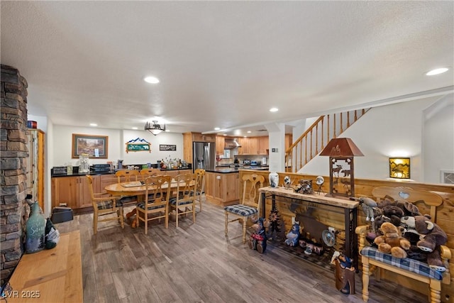 living area with recessed lighting, light wood-type flooring, and visible vents