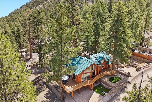 bird's eye view featuring a forest view
