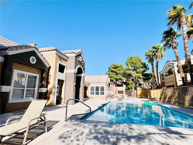 8101 W Flamingo Rd Unit 1088, Las Vegas, NV 89147 - view of swimming pool with fence, a patio area, and a fenced in pool