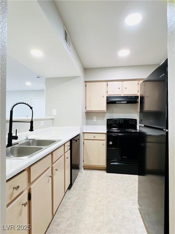 8101 W Flamingo Rd Unit 1088, Las Vegas, NV 89147 - kitchen featuring a sink, under cabinet range hood, black appliances, visible vents, and light countertops