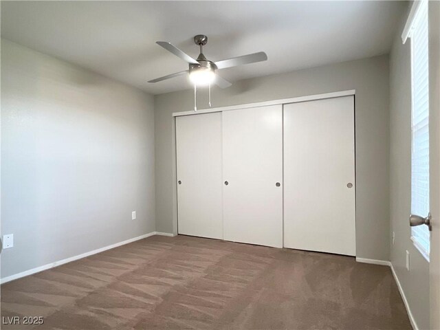 8101 W Flamingo Rd Unit 1088, Las Vegas, NV 89147 - unfurnished bedroom featuring baseboards, a ceiling fan, a closet, and carpet flooring