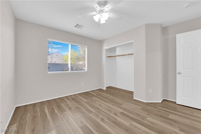 2514 Tropical Sands Ave, North Las Vegas, NV 89031 - unfurnished bedroom featuring baseboards, visible vents, wood finished floors, and a closet