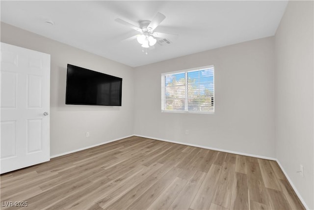 2514 Tropical Sands Ave, North Las Vegas, NV 89031 - empty room featuring baseboards, a ceiling fan, and light wood-style flooring