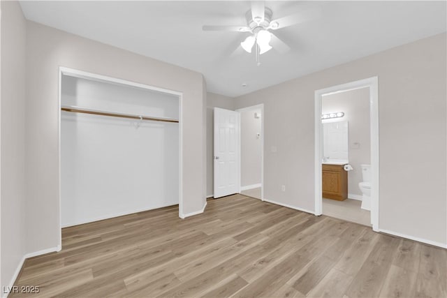 2514 Tropical Sands Ave, North Las Vegas, NV 89031 - unfurnished bedroom with a closet, baseboards, ensuite bathroom, and light wood-type flooring