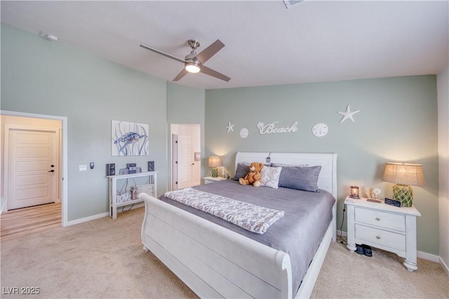 carpeted bedroom with baseboards and ceiling fan