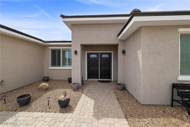 3660 Stirrup, Pahrump, NV 89048 - entrance to property featuring stucco siding