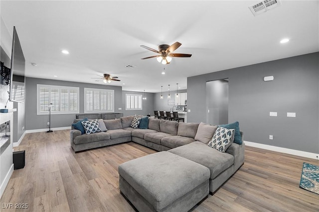 3660 Stirrup, Pahrump, NV 89048 - living area with visible vents, ceiling fan, recessed lighting, and baseboards