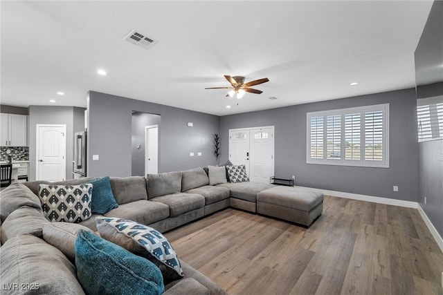 3660 Stirrup, Pahrump, NV 89048 - living area with recessed lighting, ceiling fan, visible vents, baseboards, and wood finished floors