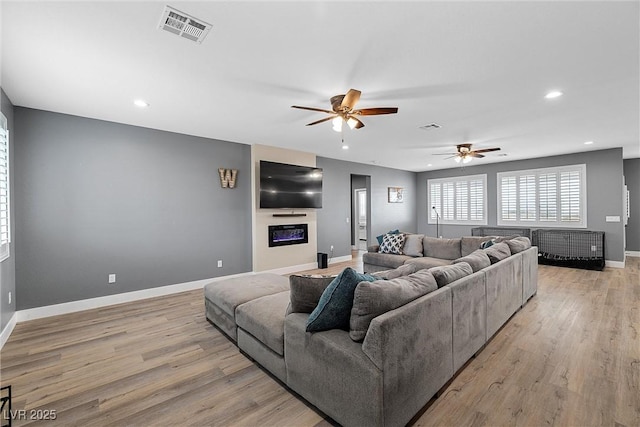 3660 Stirrup, Pahrump, NV 89048 - living area featuring baseboards, visible vents, ceiling fan, and recessed lighting