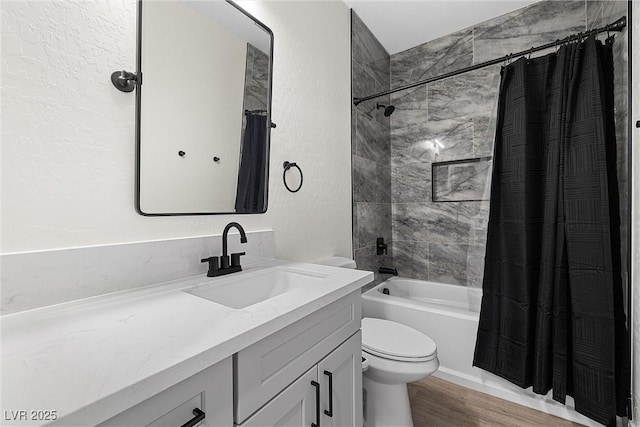 3660 Stirrup, Pahrump, NV 89048 - full bathroom featuring wood finished floors, toilet, vanity, and shower / tub combo with curtain
