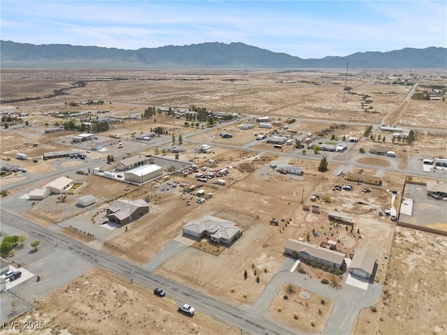 3660 Stirrup, Pahrump, NV 89048 - birds eye view of property featuring view of desert, a mountain view, and a rural view