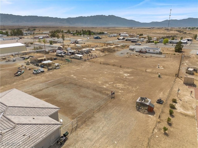 3660 Stirrup, Pahrump, NV 89048 - drone / aerial view with a mountain view and view of desert