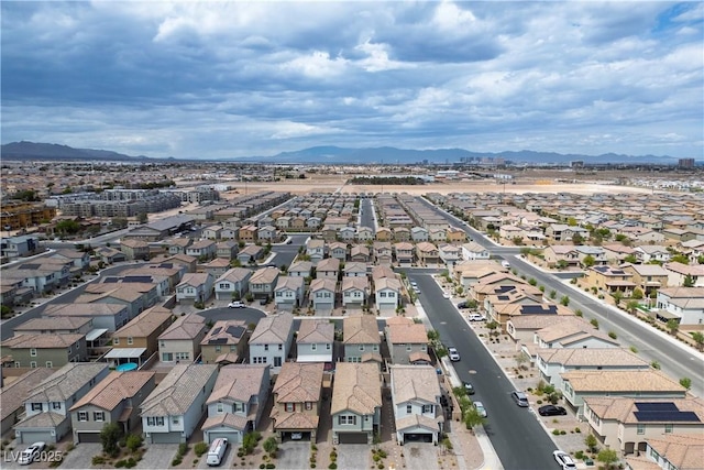 bird's eye view featuring a mountain view and a residential view