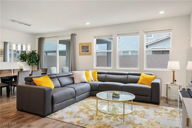 living room featuring recessed lighting and wood finished floors