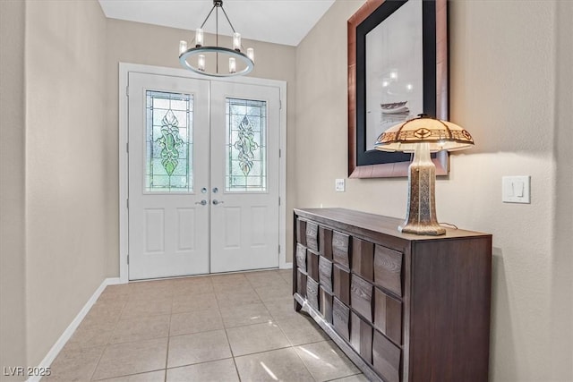 2132 Twin Falls Dr, Henderson, NV 89044 - foyer with a chandelier, baseboards, and light tile patterned flooring