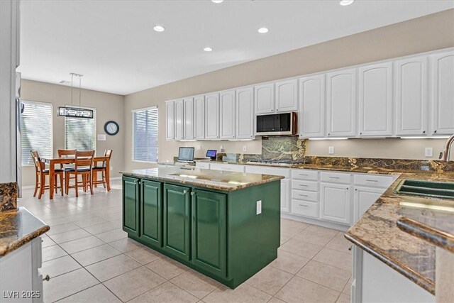 2132 Twin Falls Dr, Henderson, NV 89044 - kitchen with a sink, stainless steel appliances, white cabinetry, plenty of natural light, and recessed lighting