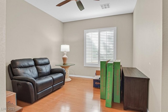 2132 Twin Falls Dr, Henderson, NV 89044 - sitting room with a ceiling fan, light wood finished floors, and baseboards
