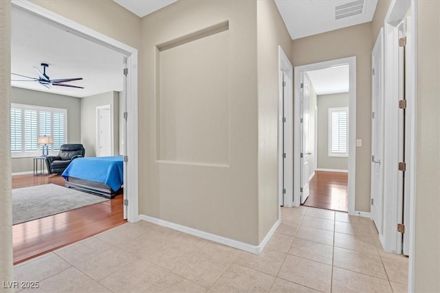 2132 Twin Falls Dr, Henderson, NV 89044 - corridor featuring light tile patterned floors and baseboards
