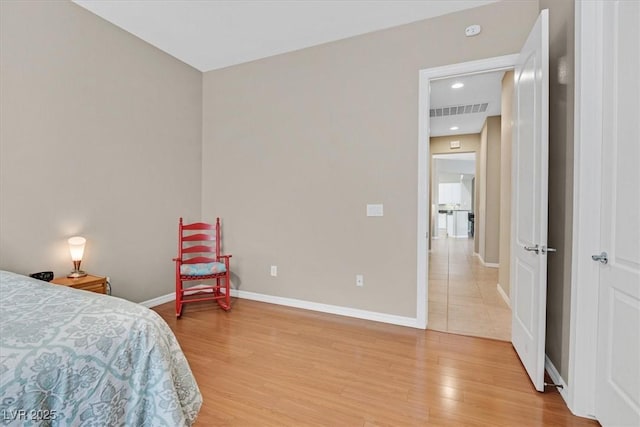 2132 Twin Falls Dr, Henderson, NV 89044 - bedroom featuring baseboards, light wood-style floors, and recessed lighting