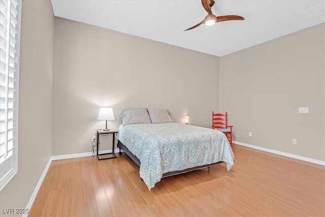 2132 Twin Falls Dr, Henderson, NV 89044 - bedroom with light wood-style floors, baseboards, and ceiling fan