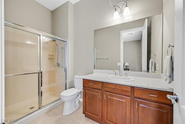 2132 Twin Falls Dr, Henderson, NV 89044 - bathroom featuring toilet, vanity, a shower stall, and tile patterned floors