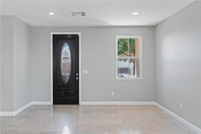 entrance foyer featuring recessed lighting, visible vents, and baseboards