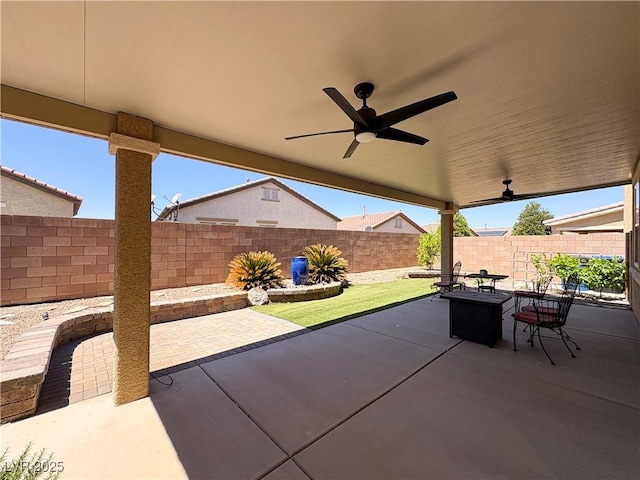 view of patio / terrace with ceiling fan and a fenced backyard