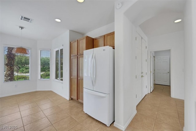 kitchen featuring visible vents, light tile patterned floors, recessed lighting, and freestanding refrigerator