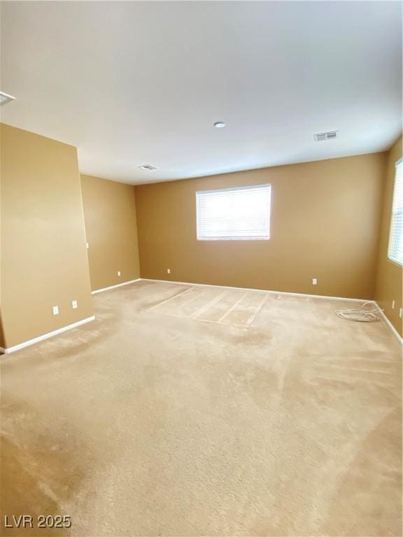 10349 Mystic Pine Rd, Las Vegas, NV 89135 - spare room with baseboards and light carpet