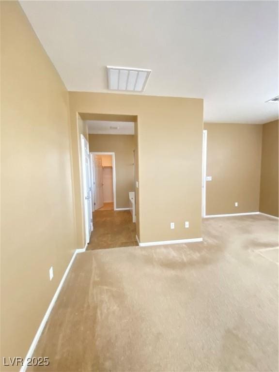 10349 Mystic Pine Rd, Las Vegas, NV 89135 - empty room featuring baseboards and light carpet