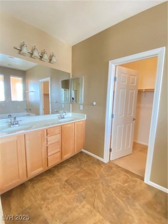 10349 Mystic Pine Rd, Las Vegas, NV 89135 - full bath featuring double vanity and a walk in closet