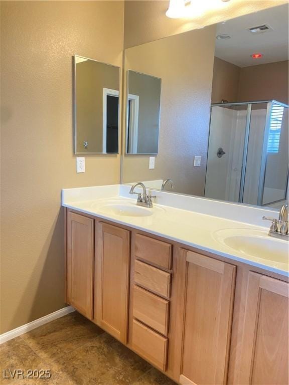 10349 Mystic Pine Rd, Las Vegas, NV 89135 - full bath featuring double vanity, a stall shower, and baseboards