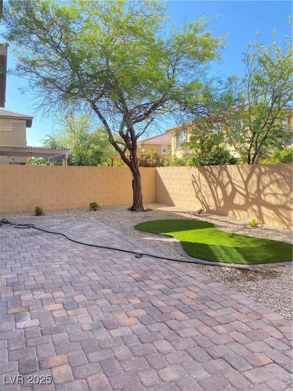 10349 Mystic Pine Rd, Las Vegas, NV 89135 - view of patio / terrace featuring a fenced backyard