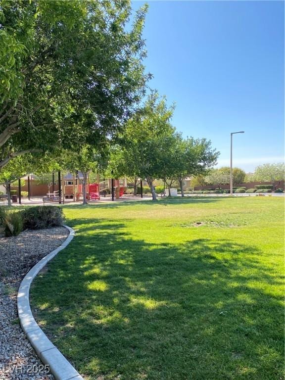 10349 Mystic Pine Rd, Las Vegas, NV 89135 - view of home's community featuring a lawn