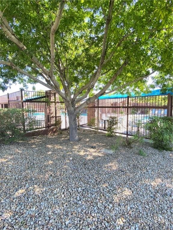 10349 Mystic Pine Rd, Las Vegas, NV 89135 - view of yard with fence