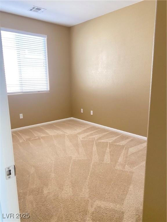 10349 Mystic Pine Rd, Las Vegas, NV 89135 - empty room featuring baseboards and light colored carpet