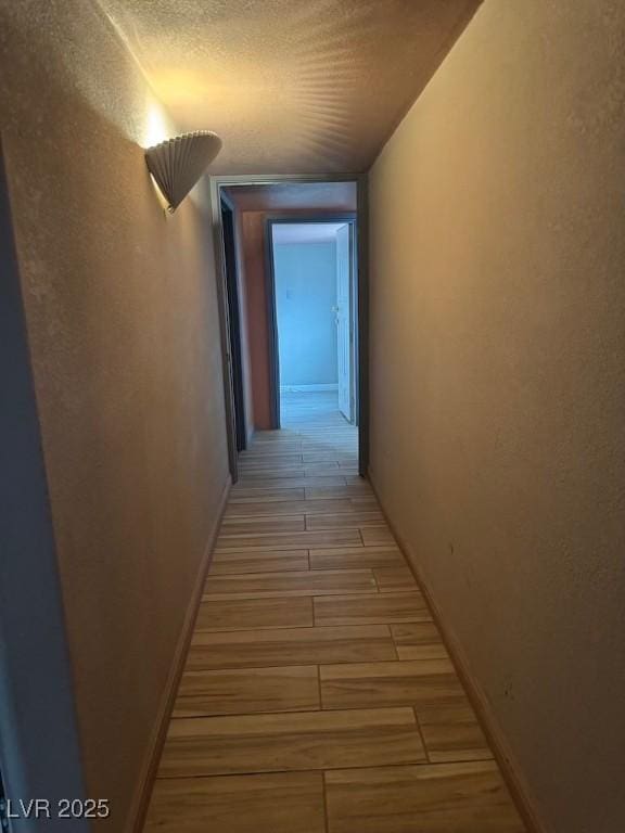 4834 E Van Buren Ave, Las Vegas, NV 89110 - hall with light wood-type flooring and baseboards
