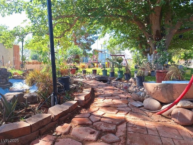 4834 E Van Buren Ave, Las Vegas, NV 89110 - view of patio / terrace with a playground